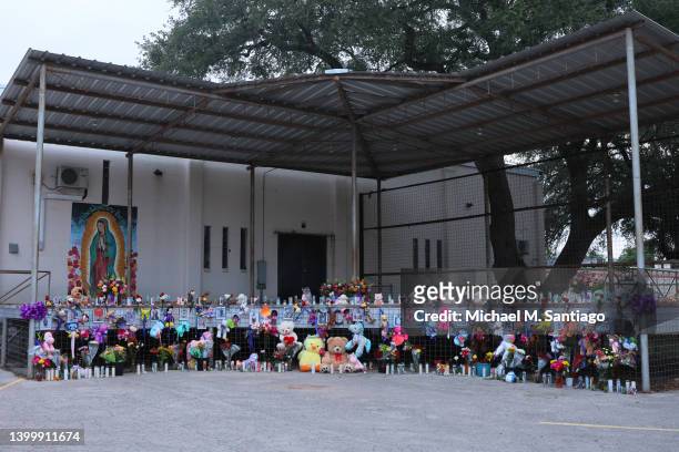Memorials for the victims of the Robb Elementary School mass shooting are displayed at Sacred Heart Catholic Church on May 29, 2022 in Uvalde, Texas....