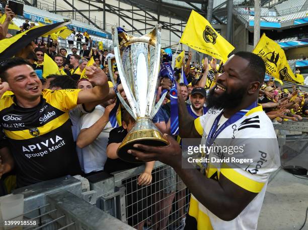 Dany Priso of La Rochelle, celebrates with the Champions Cup after their victory during the Heineken Champions Cup Final match between Leinster Rugby...