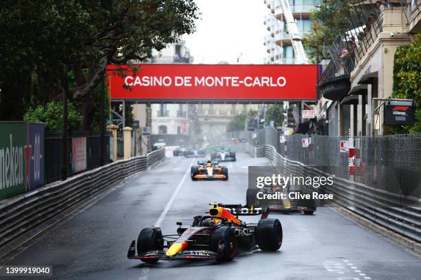 Sergio Perez of Mexico driving the Oracle Red Bull Racing RB18 leads Max Verstappen of the Netherlands driving the Oracle Red Bull Racing RB18 during...