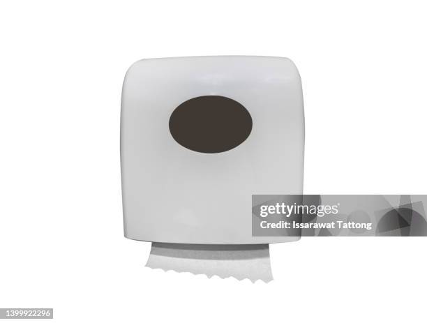 dispenser for paper towels, white equipment for public toilets, hygiene care and clean hands, wall-mounted roll towel holder isolated on white background - clean closet stockfoto's en -beelden