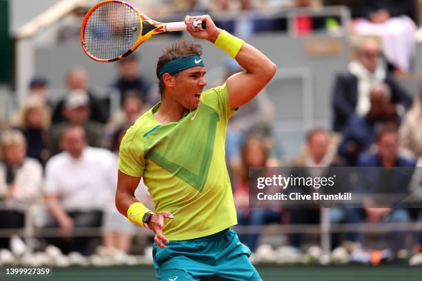 Rafael Nadal of Spain plays a forehand against Felix Auger-Aliassime of Canada during the Men's Singles Fourth Round match on Day 8 of The 2022...