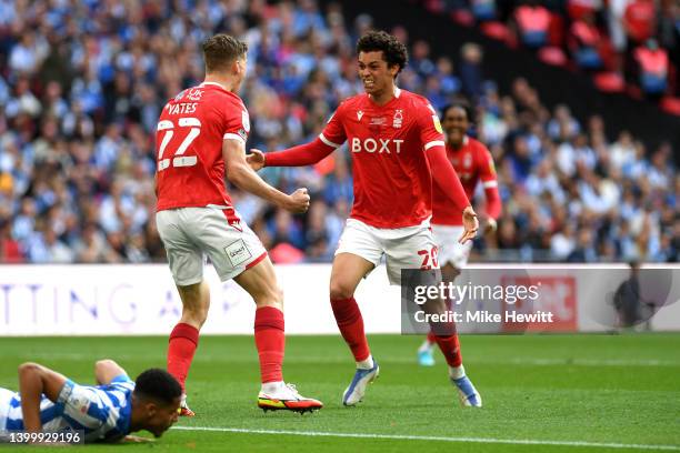 Ryan Yates and Brennan Johnson of Nottingham Forest celebrate their sides first goal, an own goal scored by Levi Colwill of Huddersfield Town during...