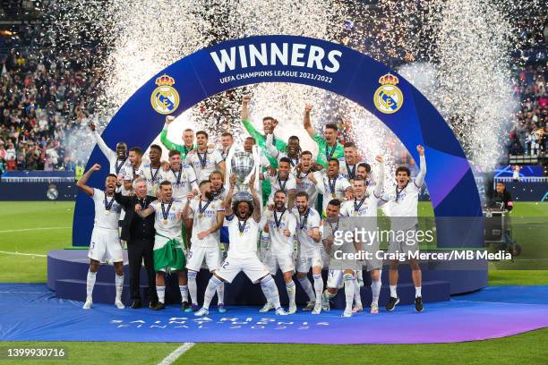 Marcelo of Real Madrid lifts the winners trophy and celebrates with team mates after the UEFA Champions League final match between Liverpool FC and...