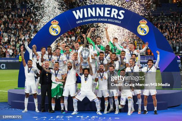 Marcelo of Real Madrid lifts the winners trophy and celebrates with team mates after the UEFA Champions League final match between Liverpool FC and...