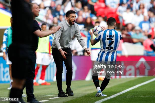 Carlos Corberan of Huddersfield Town throws the match ball to Pipa of Huddersfield Town during the Sky Bet Championship Play-Off Final match between...