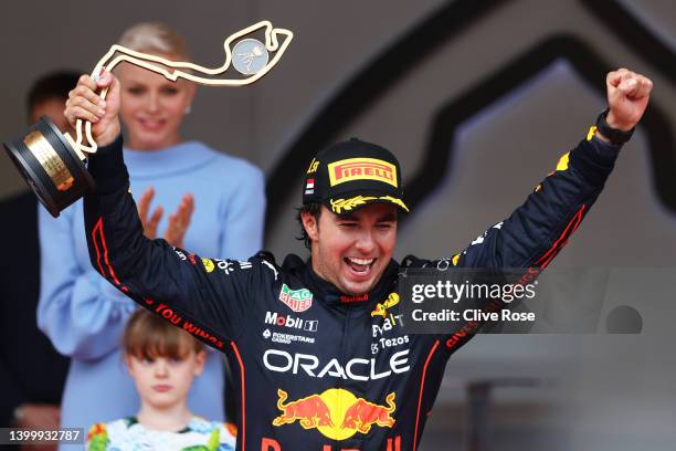 Race winner Sergio Perez of Mexico and Oracle Red Bull Racing celebrates on the podium during the F1 Grand Prix of Monaco at Circuit de Monaco on May...