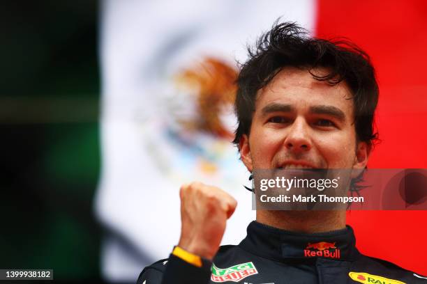 Race winner Sergio Perez of Mexico and Oracle Red Bull Racing celebrates on the podium during the F1 Grand Prix of Monaco at Circuit de Monaco on May...