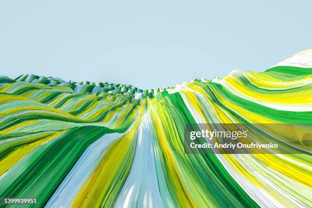 abstract multi coloured stripe patterned landscape - vitalità foto e immagini stock