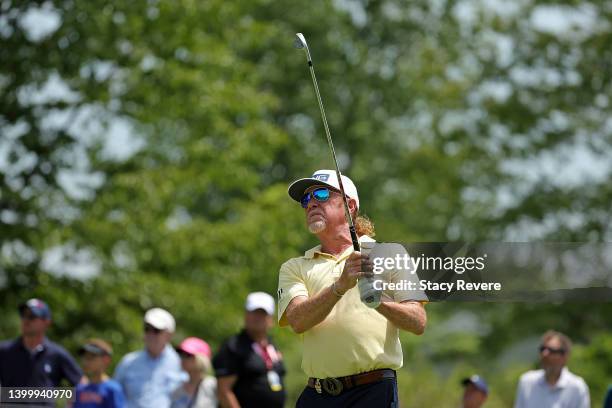 Miguel Angel Jimenez of Spain hits his tee shot on the second hole during the final round of the Senior PGA Championship presented by KitchenAid at...