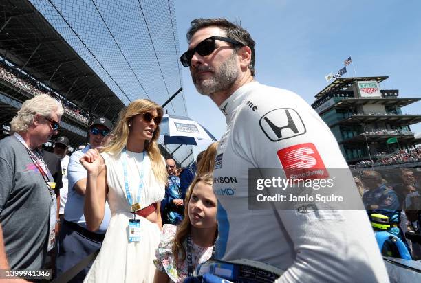 Jimmie Johnson, driver of the Chip Ganassi Racing Carvana Honda, prepares to get in his car prior to the 106th Running of The Indianapolis 500 at...