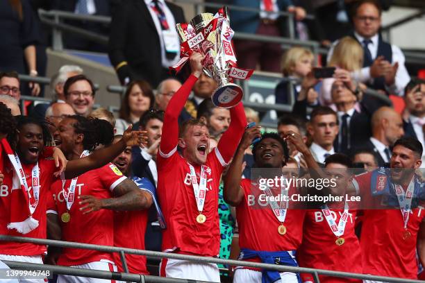 Joe Worrall of Nottingham Forest lifts the trophy following their team's victory in the Sky Bet Championship Play-Off Final match between...