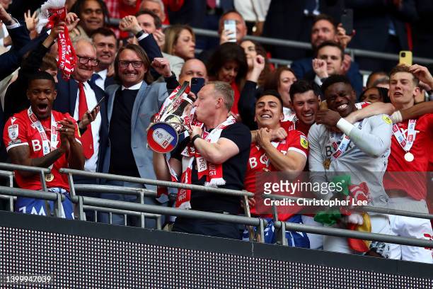 Steve Cooper, Manager of Nottingham Forest kisses the trophy following their victory in the Sky Bet Championship Play-Off Final match between...