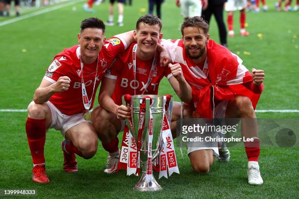 Joe Lolley, Ryan Yates and Philip Zinckernagel of Nottingham Forest celebrate with the trophy following their sides victory in the Sky Bet...