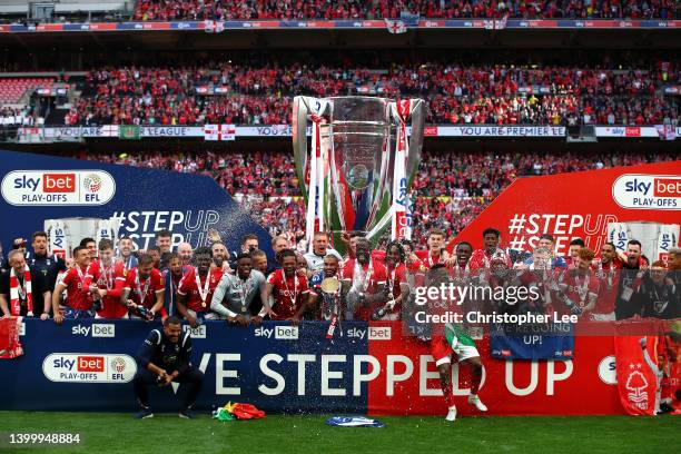 Lewis Grabban of Nottingham forest lifts the trophy following their team's victory in the Sky Bet Championship Play-Off Final match between...