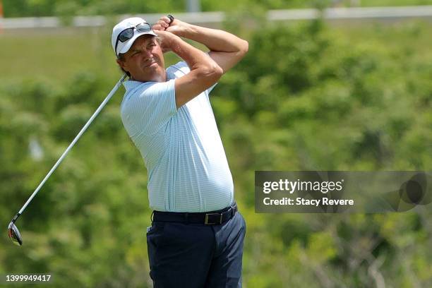 Stephen Ames of Canada hits his tee shot on the seventh hole during the final round of the Senior PGA Championship presented by KitchenAid at Harbor...