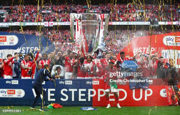 Lewis Grabban of Nottingham forest lifts the trophy following their team's victory in the Sky Bet Championship Play-Off Final match between...