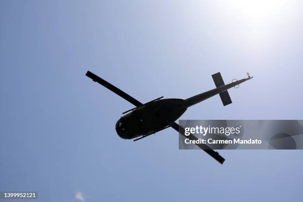 Bell UH-1 helicopter is seen during the Military Flyover commemorating Memorial Day during the final round of the Charles Schwab Challenge at...