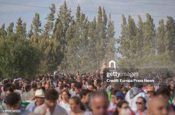 The Virgin of El Rocio covered with the traditional robes in the transfer from the municipality of Almonte to the village of El Rocio. On May 29 in...