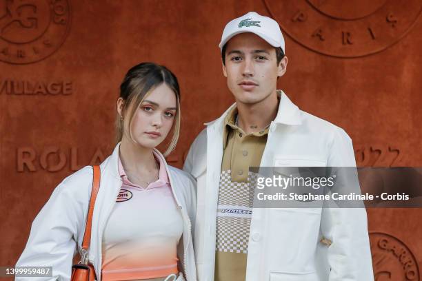 Lucas Omulek and Jane Cara attend the French Open 2022 at Roland Garros on May 28, 2022 in Paris, France.
