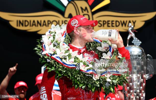 Marcus Ericsson of Sweden, driver of the Chip Ganassi Racing Honda, celebrates with milk in Victory Lane after winning the 106th Running of The...