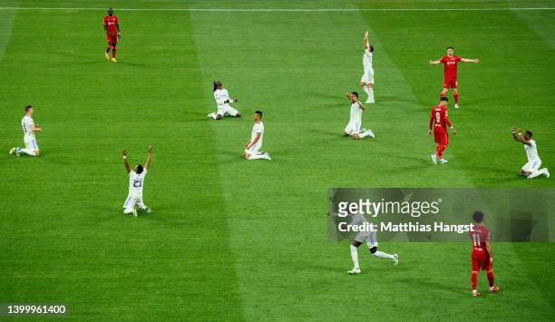 Players of Real Madrid celebrate as the final whistle is blown to confirm them as winners of the UEFA Champions League following victory in the UEFA...
