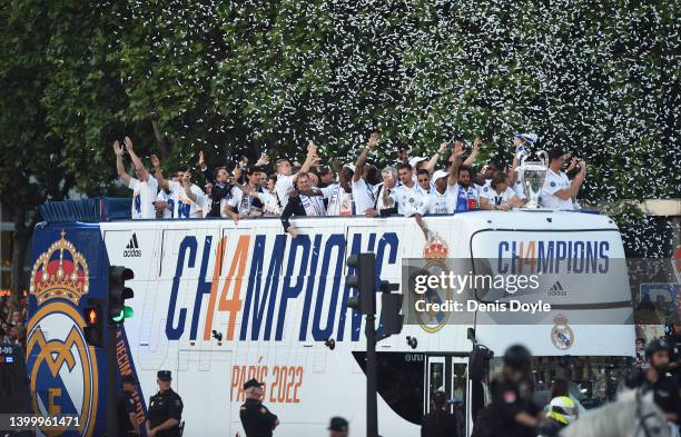 Real Madrid players celebrate on an open-top bus Marcelo after winning the UEFA Champions League Final on May 29, 2022 in Madrid, Spain.