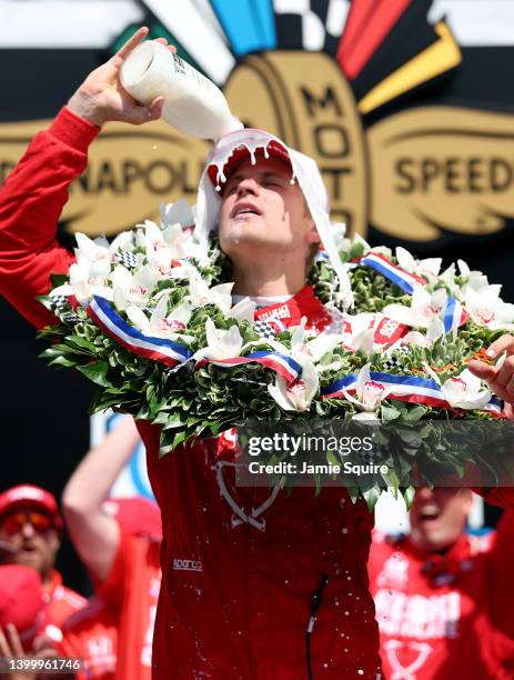 Marcus Ericsson of Sweden, driver of the Chip Ganassi Racing Honda, celebrates in Victory Lane by pouring milk on his head after winning the 106th...