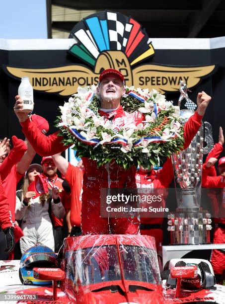 Marcus Ericsson of Sweden, driver of the Chip Ganassi Racing Honda, celebrates in Victory Lane after winning the 106th Running of The Indianapolis...