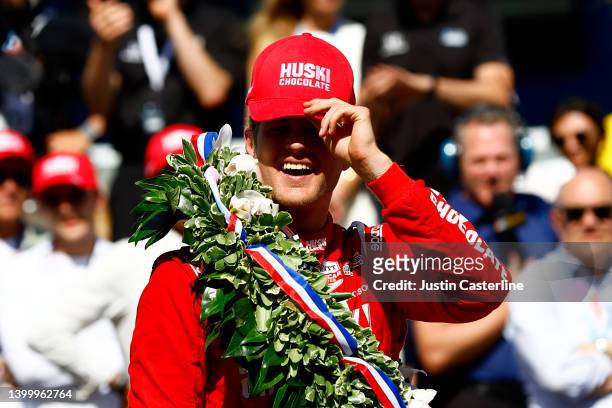 Marcus Ericsson of Sweden, driver of the Chip Ganassi Racing Honda, looks to the crowd after kissing the bricks after winning the 106th Running of...