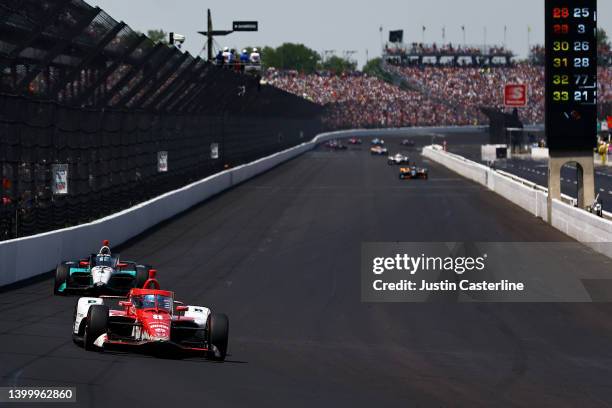 Marcus Ericsson, driver of the Huski Chocolate Chip Ganassi Racing Honda, leads a pack of cars during the 106th running of the Indianapolis 500 at...