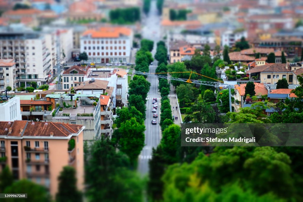 Road between buildings seen from above