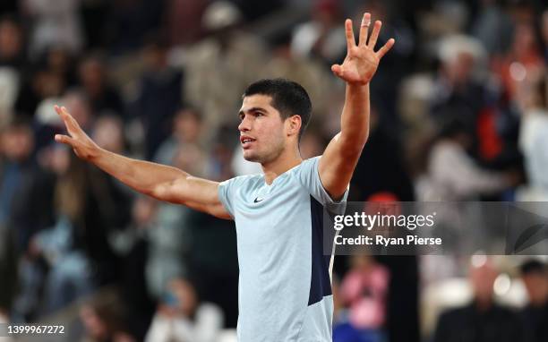 Carlos Alcaraz of Spain celebrates match point against Karen Khachanov during the Men's Singles Fourth Round match on Day 8 of The 2022 French Open...