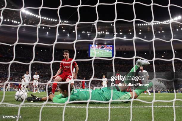 Thibaut Courtois of Real Madrid makes a save from Diogo Jota of Liverpool during the UEFA Champions League final match between Liverpool FC and Real...