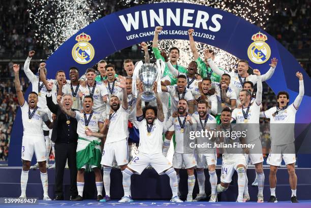 Marcelo of Real Madrid lifts the UEFA Champions League trophy after their sides victory during the UEFA Champions League final match between...