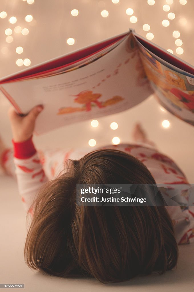 Boy reading book