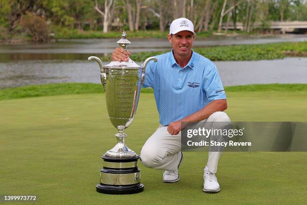 Steven Alker of New Zealand poses with the Alfred S. Bourne trophy after winning the Senior PGA Championship presented by KitchenAid at Harbor Shores...