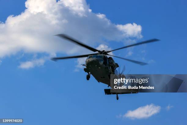 Army Fort Bragg Blackhawk performs a demo during pre-race ceremonies prior to the NASCAR Cup Series Coca-Cola 600 at Charlotte Motor Speedway on May...