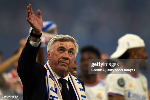 Ancelotti head Coach of Real Madrid salutes during celebrations at estadio Santiago Bernabeu after winning the UEFA Champions League Final on May 29,...