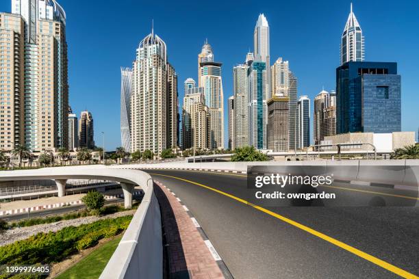 dubai traffic junction in downtown district - empty road stock pictures, royalty-free photos & images