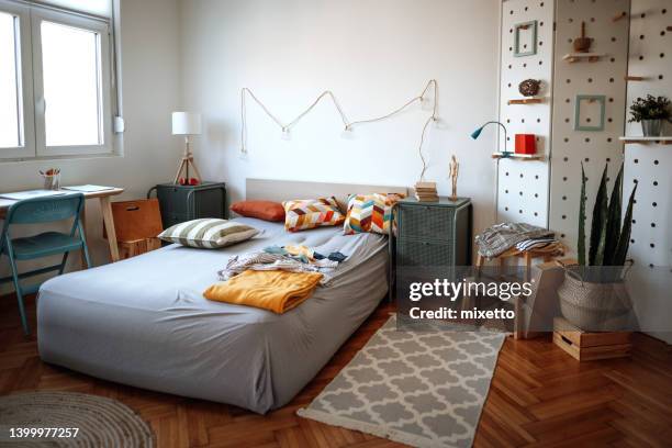 empty cozy bedroom - carpet mess stock pictures, royalty-free photos & images