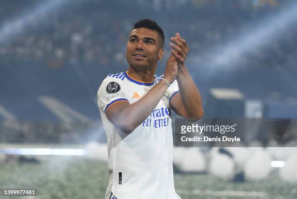 Casemiro of Real Madrid applauds supporters during celebrations at estadio Santiago Bernabeu after winning the UEFA Champions League Final on May 29,...