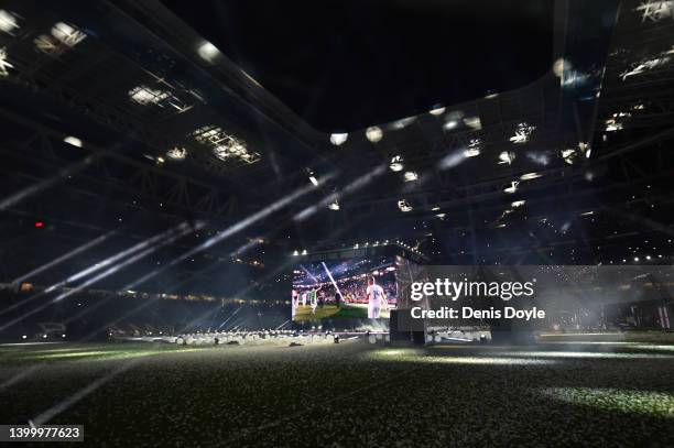 Real Madrid players are projected on a giant screen during celebrations at estadio Santiago Bernabeu after winning the UEFA Champions League Final on...