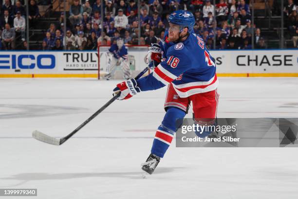 Andrew Copp of the New York Rangers skates with the puck against the Carolina Hurricanes in Game Four of the Second Round of the 2022 Stanley Cup...