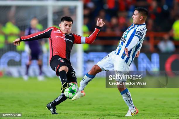 Erick Sanchez of Pachuca fights for the ball with Aldo Rocha of Atlas during the final second leg match between Pachuca and Atlas as part of the...