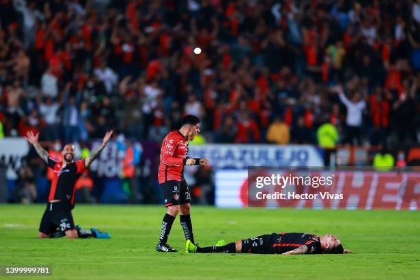 Emanuel Aguilera, Aldo Rocha and Edgar Zaldívar of Atlas celebrate their championship after the final second leg match between Pachuca and Atlas as...