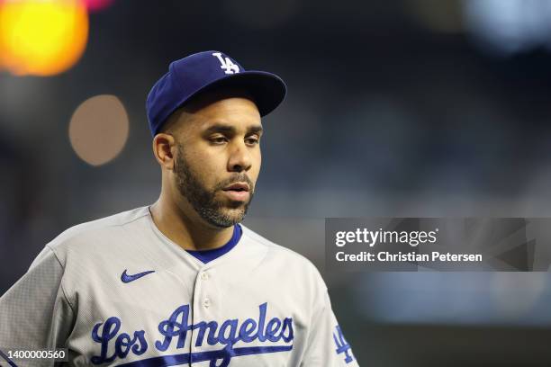 Relief pitcher David Price of the Los Angeles Dodgers walks to the dugout during the seventh inning of the MLB game against the Arizona Diamondbacks...