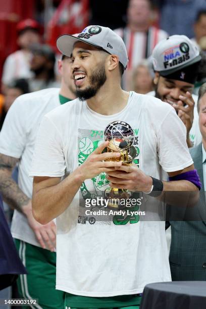 Jayson Tatum of the Boston Celtics celebrates with his teammatesafter being awarded the Eastern Conference Larry Bird MVP trophy after defeating the...