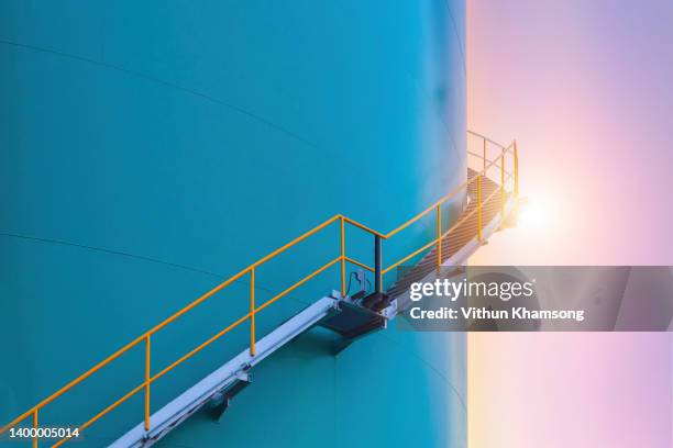 water tank and stair with sky at factory - oil tank fotografías e imágenes de stock