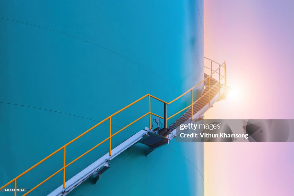 Water tank and stair with sky at factory