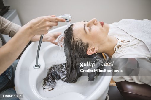 Getting A Hair Wash In A Hair Salon High-Res Stock Photo - Getty Images